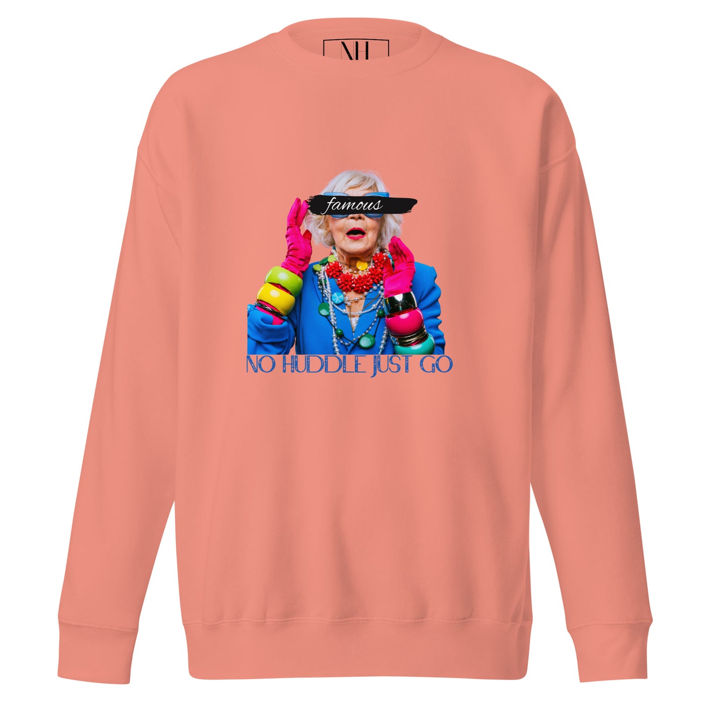 Front view of our ‘No Huddle Just Go’ Premium Unisex Sweatshirt in dusty rose, featuring “Famous” graphic on the front. Add this signature sweatshirt to your collection! Customers love our Premium Unisex Sweatshirts because they have all the essentials; 100% cotton face, soft interior, comfortable Unisex fit and are medium thickness. This sweatshirt is available now in various colors & sizes S-3XL.