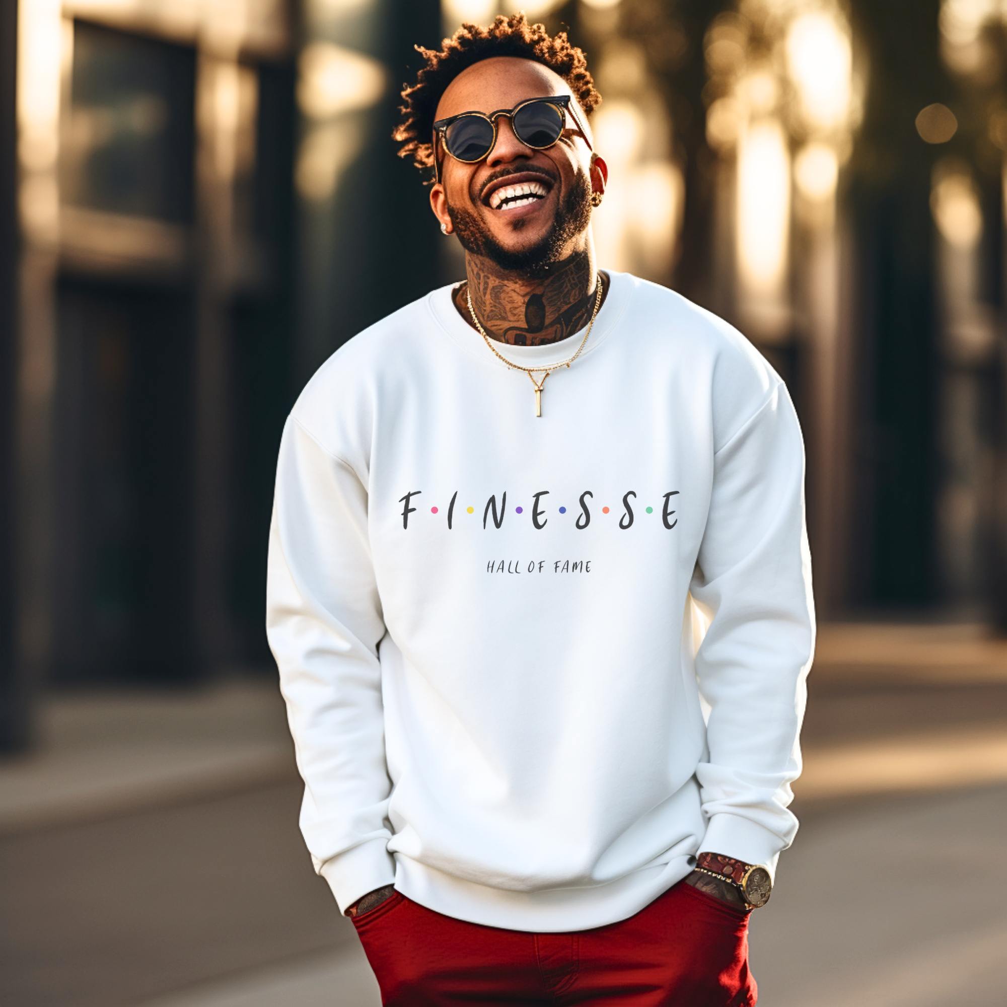 Male model wearing white signature sweatshirt featuring ‘No Huddle Just Go’ Finesse design, a premium essential for any wardrobe