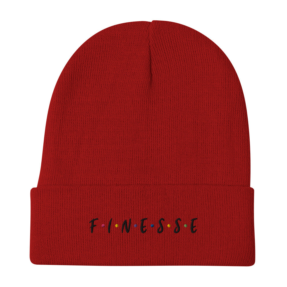 Front view of our ‘Finesse” beanie in red, featuring premium embroidered “Finesse” in black text on the front. Add this signature beanie to your collection! Customers love our cozy and warm beanie. This beanie is a one size fits all available now in various colors.