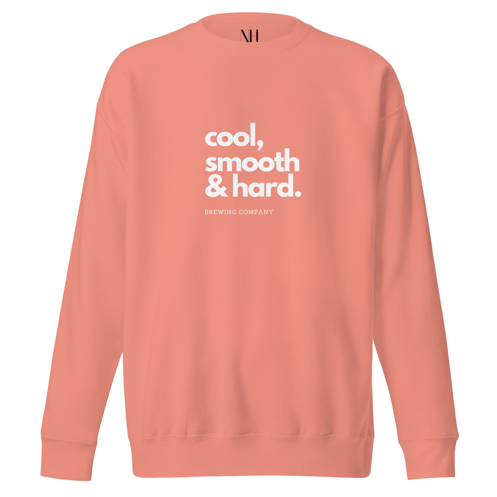 Front view of our ‘No Huddle Just Go’ Premium Unisex Sweatshirt in dusty rose, featuring “cool, smooth & hard” on the front in white text. Add this signature sweatshirt to your collection! Customers love our Premium Unisex Sweatshirts because they have all the essentials; 100% cotton face, soft interior, comfortable Unisex fit and are medium thickness. This sweatshirt is available now in various colors & sizes S-3XL.
